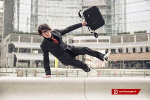 Man with elegant suit running at work because in late - Concepts of business,overcoming problems,competition and urban urban life